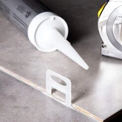 Juvale 400 Pack Tile Leveling Clips Reusable Plastic Leveling Spacer Clips (White, 1/32 Inch) -Floor Promotion Store af54d660 04e9 4884 862e d13c69d091af.beecc63a5d0759f27fa3a38d714eb171 1800x1800